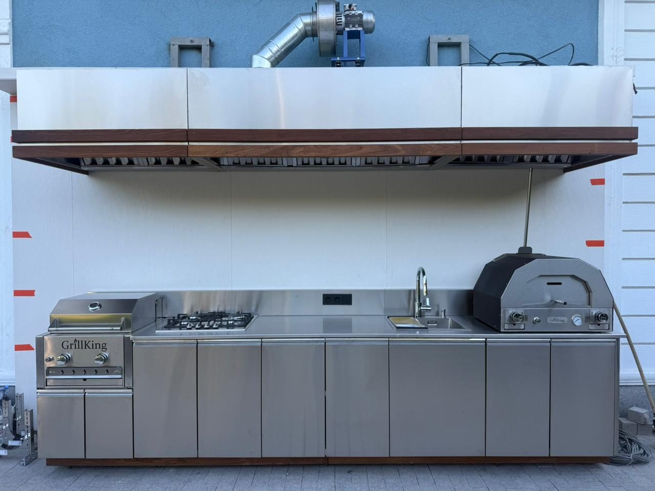GrillKing ventilation with its external fan above a steel kitchen run