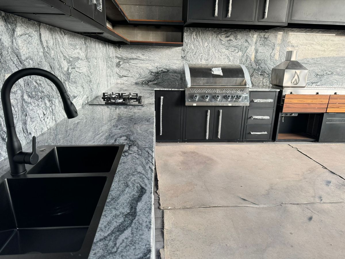A GrillKing 304 stainless kitchen with restaurant-grade ventilation in a yard outside Almaty