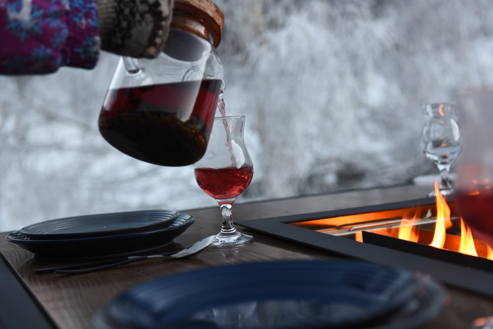 Fire down the center of the King's Table with a drink being poured