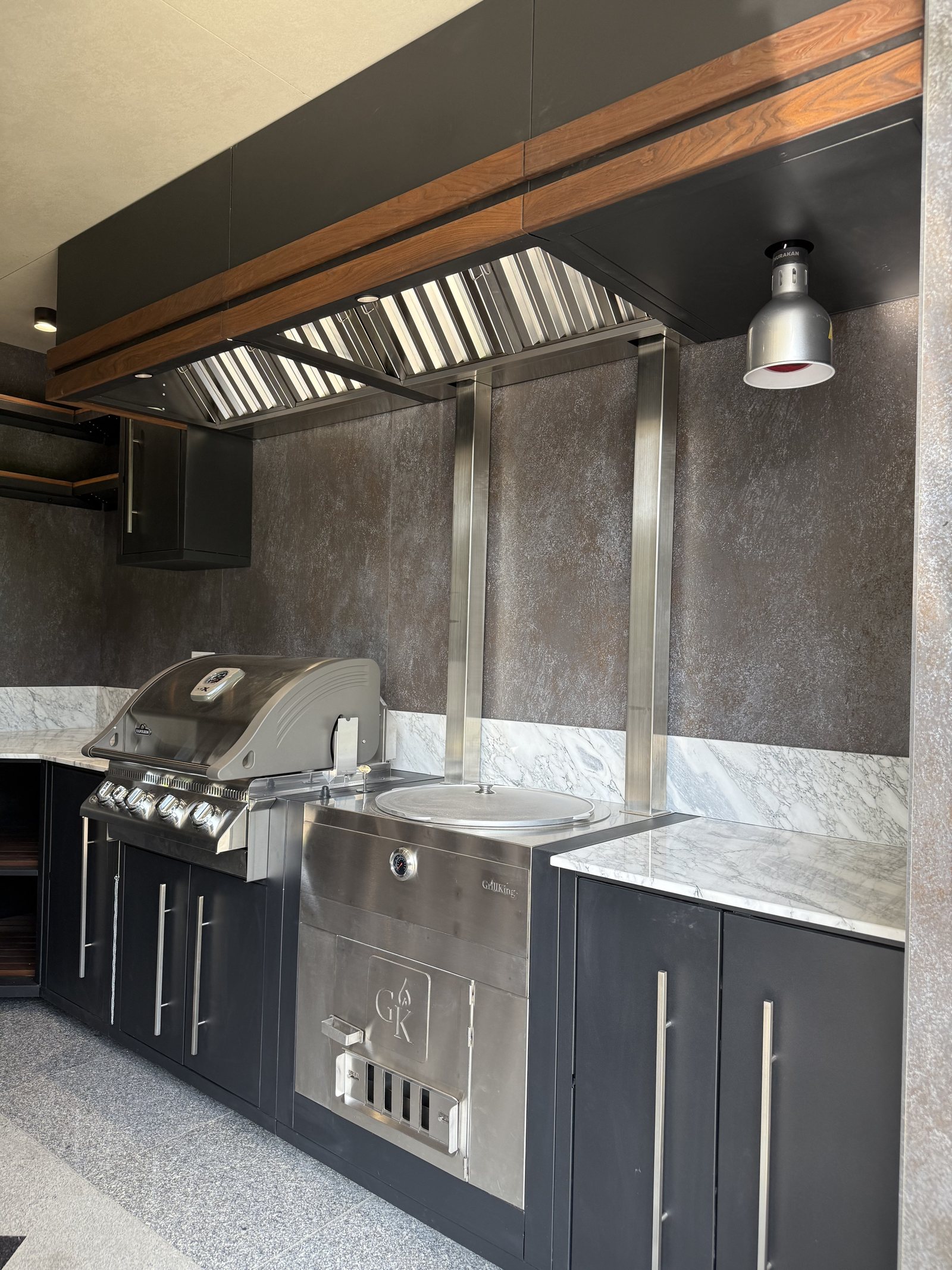 Pizza oven: flame in the hearth, pizza on the peel